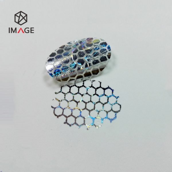 honeycomb residues appear if remove this oval shaped hologram sticker