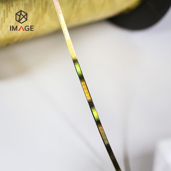 tear tape gold with holographic logo pattern