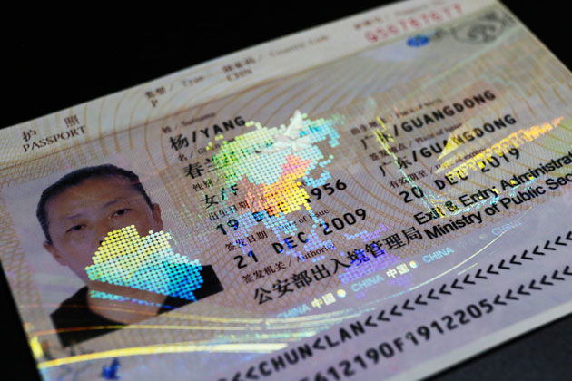 hologram transfer film for protection of paper based passport data pages