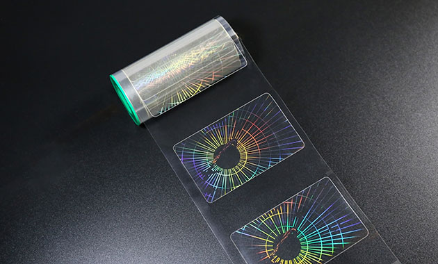 transparent holographic film overlay for printed cards