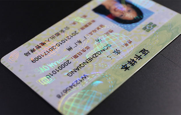 Combining Holographic Overlays with Retransfer Printing Cards