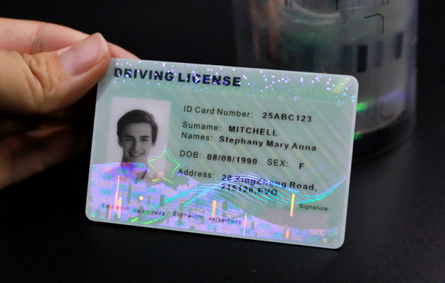 driver license with optical security lamination overlays