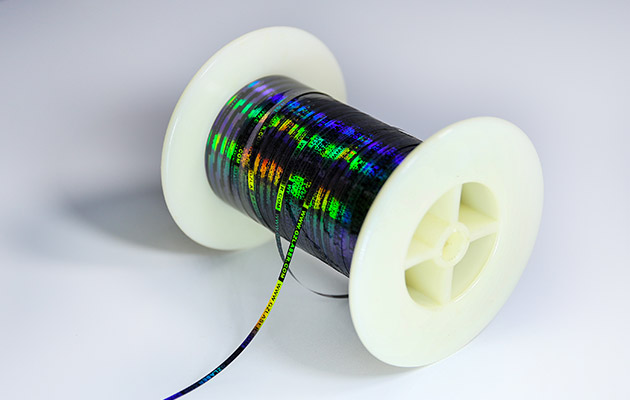 optical security thread, a narrow film with advanced optical features