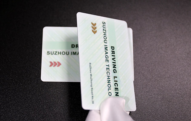 secure PC cards with optically variable ink technology show a stable color change from magenta to gold when the viewing angle is adjusted.