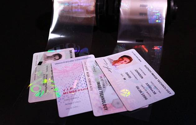 Personalized ID cards with hologram overlays and optical security laminates used for secure card solutions
