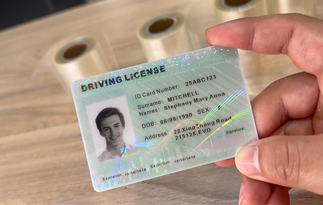 Laser-personalized PC ID card with variable data protected by a hologram laminate patch