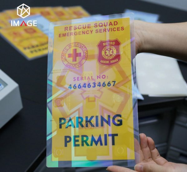 laminte parking permit with the hologram pouch together